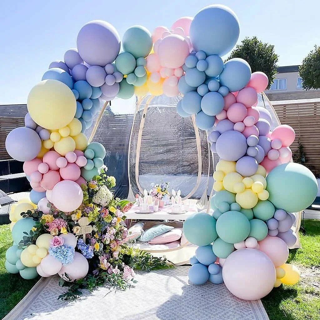 a multicolored balloon arch without helium